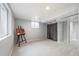 Versatile bonus room illuminated by natural light, complete with storage area at 795 N Jersey St, Denver, CO 80220