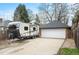 Detached garage with plenty of space, complemented by RV parking and meticulous landscaping, enhances this inviting home at 795 N Jersey St, Denver, CO 80220