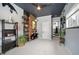 Stylish living room boasting exposed brick, decor shelving, and ceiling fan at 795 N Jersey St, Denver, CO 80220