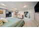 Spacious bedroom featuring neutral tones, recessed lighting, and ensuite access at 795 N Jersey St, Denver, CO 80220