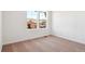 Bright bedroom features large windows that provide plenty of natural light at 8339 Snake River St, Littleton, CO 80125
