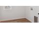 The laundry room features wood-look flooring and utility connections at 8339 Snake River St, Littleton, CO 80125