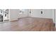 Spacious living room features wood floors, large windows, and a sliding glass door at 8339 Snake River St, Littleton, CO 80125