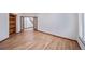 Spacious office showcases hardwood floors, built-in shelving, and French doors for an organized, private workspace at 5416 S Hannibal Ct, Centennial, CO 80015