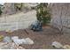 Relaxing Adirondack chairs nestled in the backyard landscaping, creating a peaceful retreat at 10526 Fairhurst Way, Highlands Ranch, CO 80126