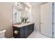 This spacious bathroom features a double sink vanity, tasteful decor and great lighting at 10526 Fairhurst Way, Highlands Ranch, CO 80126