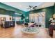 Spacious dining area with an open floor plan, hardwood floors, and access to the outdoors at 10526 Fairhurst Way, Highlands Ranch, CO 80126
