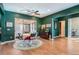 Dining area with decorative lighting, patio access and adjacent to the living room at 10526 Fairhurst Way, Highlands Ranch, CO 80126