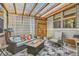 Relaxing outdoor patio with a gas firepit, comfortable seating, and stylish decor at 10526 Fairhurst Way, Highlands Ranch, CO 80126