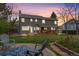 Spacious backyard with a deck and lawn, perfect for outdoor entertaining at 5310 S Flanders Way, Centennial, CO 80015