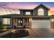 Charming two-story home featuring a well-manicured yard and brick accents at 5310 S Flanders Way, Centennial, CO 80015
