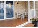 Inviting front porch with seating, offering a cozy and welcoming entrance to the home at 5310 S Flanders Way, Centennial, CO 80015