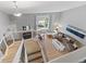 Upper-level living room overlooking the entry with lots of natural light at 5310 S Flanders Way, Centennial, CO 80015