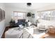 Bright living room featuring large windows and modern decor at 1280 Fairfax St, Denver, CO 80220