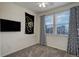 Bright bedroom with ceiling fan and windows at 23070 York Ave, Parker, CO 80138