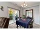 Bright dining area with a sliding door to a patio at 23070 York Ave, Parker, CO 80138