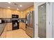 Well-equipped kitchen featuring stainless steel appliances, ample cabinet space, and modern finishes at 23070 York Ave, Parker, CO 80138