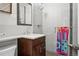 Elegant bathroom with a glass shower, updated vanity, and modern design at 2925 S Harrison St, Denver, CO 80210