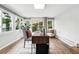 Inviting home office with hardwood floors, lots of natural light and a large, modern wood desk at 2925 S Harrison St, Denver, CO 80210