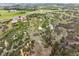 Extensive property showcasing diverse landscapes, including meadows, woodlands, and a cluster of buildings at 2938 Wolfensberger Rd, Sedalia, CO 80135