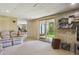 Finished basement Gathering room with walk-out patio and access to the backyard at 2938 Wolfensberger Rd, Sedalia, CO 80135