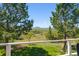 Beautiful outdoor view from the balcony showcasing lush green landscapes and rolling hills at 2938 Wolfensberger Rd, Sedalia, CO 80135