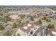 Aerial view of neighborhood featuring home, mature trees and landscaping at 6617 S Forest Way # E, Centennial, CO 80121