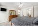 Cozy bedroom with a large window for plenty of natural light at 6617 S Forest Way # E, Centennial, CO 80121