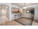 Dining room featuring a breakfast bar and hardwood floors at 6617 S Forest Way # E, Centennial, CO 80121