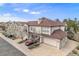 Beautiful townhome featuring an attached garage, private balconies, and lovely curb appeal at 6617 S Forest Way # E, Centennial, CO 80121