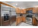 Beautiful kitchen featuring stainless steel appliances and plentiful cabinet space at 6617 S Forest Way # E, Centennial, CO 80121