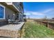 Backyard features patio with furniture, perfect for outdoor entertaining at 3534 N Meadows Dr, Castle Rock, CO 80109