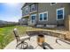 Relaxing backyard with a cozy fire pit and comfortable seating at 3534 N Meadows Dr, Castle Rock, CO 80109