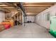 Spacious unfinished basement with exposed beams, offering a blank canvas for design at 3534 N Meadows Dr, Castle Rock, CO 80109