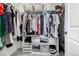 Organized walk-in closet with ample hanging space and storage cubes, great for organization at 3534 N Meadows Dr, Castle Rock, CO 80109