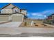 Two-story home with a two car garage and a concrete driveway at 3534 N Meadows Dr, Castle Rock, CO 80109