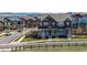 Attractive two-story home with a covered porch and landscaped front yard at 3534 N Meadows Dr, Castle Rock, CO 80109