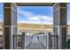 View from a porch with classic pillars and railings at 3534 N Meadows Dr, Castle Rock, CO 80109