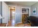 Versatile office space with hardwood floors, natural light, and access to a full bathroom at 4530 S Inca St, Englewood, CO 80110