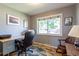 Functional home office with a large window, desk, and plenty of natural light at 4530 S Inca St, Englewood, CO 80110