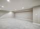 Spacious finished basement featuring neutral carpet and recessed lighting at 363 Lima St, Aurora, CO 80010