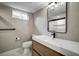 Stylish bathroom with modern vanity, sleek fixtures, and a well-lit mirror for added functionality at 363 Lima St, Aurora, CO 80010