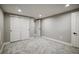 Bedroom featuring neutral carpet, recessed lighting, and closet doors at 363 Lima St, Aurora, CO 80010