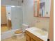 Bathroom featuring tub shower and wood vanity at 695 S Alton Way # 6B, Denver, CO 80247