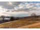 Community park with open space and mountain backdrop at 8855 Green Meadows Dr, Highlands Ranch, CO 80126