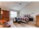 Spacious Primary bedroom with a large bed, plenty of light and ceiling fan at 8855 Green Meadows Dr, Highlands Ranch, CO 80126
