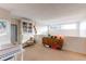 Spacious office loft with built-in shelving and wood desk at 8855 Green Meadows Dr, Highlands Ranch, CO 80126