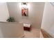 Stairs leading upstairs with a small bench for seating at 8855 Green Meadows Dr, Highlands Ranch, CO 80126