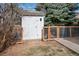 Backyard shed and fenced-in area offer storage and potential animal enclosure with access to outdoor space at 1331 Alpine St, Longmont, CO 80504