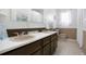 Traditional bathroom featuring a double vanity and neutral color scheme at 1331 Alpine St, Longmont, CO 80504